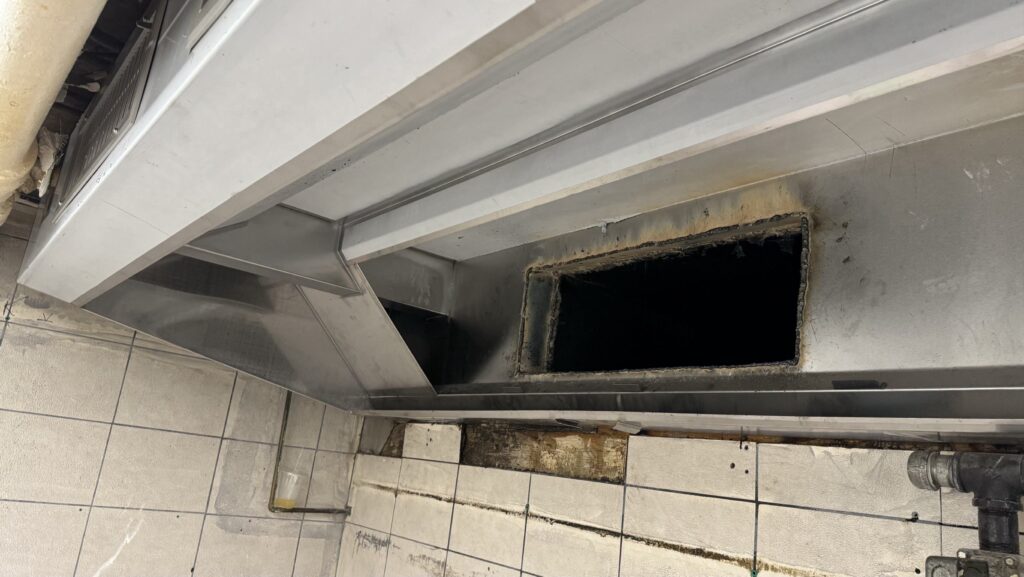 When do I replace the filters in my restaurant kitchen hood system in NYC?